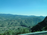 View across to the Pirannies on way up Montserrat