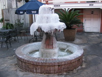 The frozen fountain in courtyard of the cafe