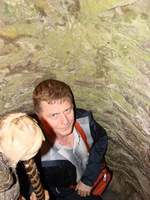 Joe climbing the spiral staircase to the top of Blarney Castle
