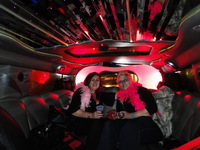 Paula and Emmy in the front of the stretch Hummer